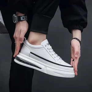 Modern white platform sneakers for men featuring air cushion sole and black side stripes
