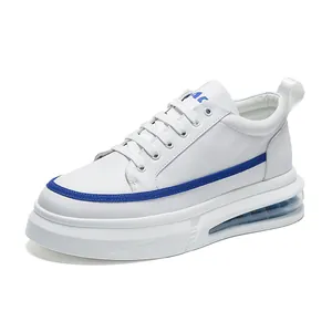 Men's fashionable white platform sneakers with blue accents and visible air cushion