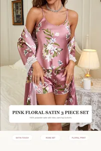 Detail of pink floral satin 3-piece pajama set including robe, cami, and shorts