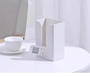 Wall-mounted waterproof tissue box with multi-functional storage design for modern bathroom.