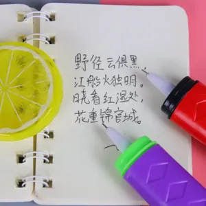 Creative samurai sword gel pen detail shot, student funny stationery close up view on notebook.