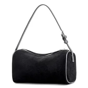 Black cylindrical shoulder bag for women, trendy chic pillow purse with adjustable single strap.