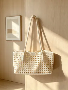 Woven lattice tote bag for women, stylish open-work shoulder handbag for casual daily commute.