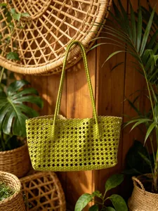 Green woven shoulder tote bag for women, stylish lattice design, casual commuter handbag.