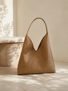 Vintage brown woven leather shoulder bag chic minimalist design large capacity hobo tote bag.
