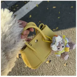Mini yellow leather handbag with cute bear pendant chic stylish daily commuting shoulder bag