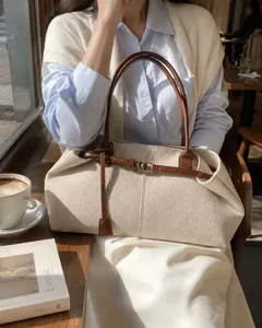 Retro large capacity women canvas tote bag with brown leather handle and belt detail for daily work