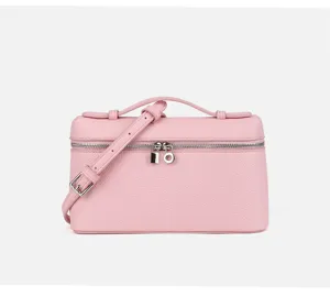 Pink mini vanity bag detail, portable crossbody box bag with silver hardware and top handle.