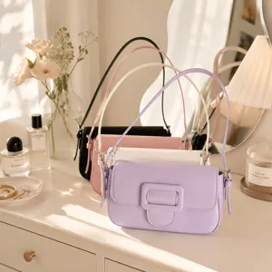 Elegant chic baguette shoulder bag detail showing stylish buckle and fine daily texture.