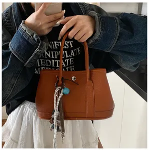 Brown pebbled leather top handle handbag fashion casual tote bag for women daily commute use.