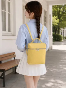 Petit sac à dos jaune minimaliste style coréen pour femmes, élégant sac à main en cuir.
