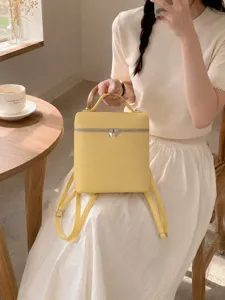 Mini sac à dos jaune style coréen chic pour femme, adorable sac de jour compact en cuir.