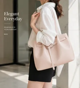 Elegant pink leather shoulder tote bag for women, stylish everyday commuter bag with metal buckle.