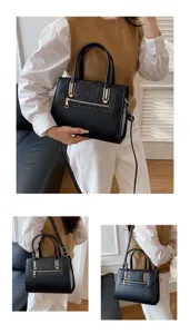Classic black shoulder bag with chic crocodile embossed flap, ideal for daily commute and style.