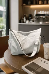 Casual nylon crossbody bag detail, lightweight daily commuter shoulder bag with multi pockets.