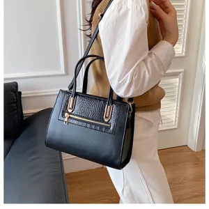 Retro casual black leather shoulder bag with chic crocodile texture and gold hardware details.