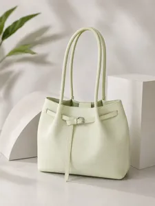 Elegant light green shoulder tote bag for women, stylish minimalist commuting handbag.