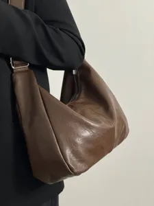 Brown slouchy shoulder bag for women, soft PU leather hobo bag, large capacity casual tote.