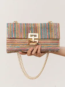 Colorful straw woven shoulder bag with gold chain and twist lock for women vacation style