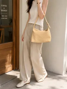 Woven shoulder bag detail highlighting premium texture, exquisite craftsmanship, daily style.