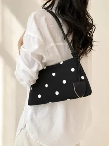 Stylish black and white polka dot underarm shoulder bag for women chic casual daily use.