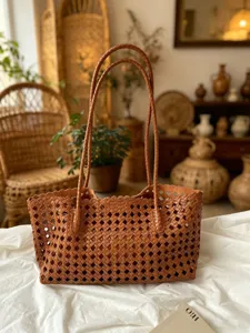 Brown woven leather shoulder tote bag, large capacity casual commuting handbag for women.