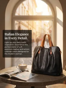 Black leather tote bag for women, soft shoulder handbag with contrast brown handles and stylish design.