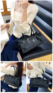 Black east-west structured leather handbag, elegant casual daily shoulder tote bag details
