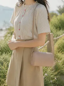 Minimalist lichee pattern leather cylindrical crossbody bag for women, versatile summer.