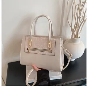 Elegant beige handbag for women, chic crocodile texture pocket shoulder messenger bag.