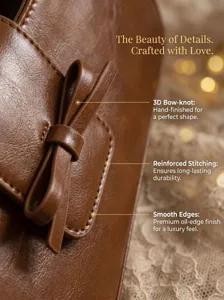 Brown leather baguette shoulder bag detail featuring a 3d bow-knot and reinforced stitching.