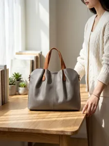 Soft leather tote bag for women, large capacity shoulder handbag with contrast brown handles.