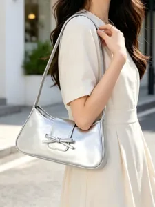 Metallic silver baguette shoulder bag for women, trendy Korean style minimalist chic bow purse.