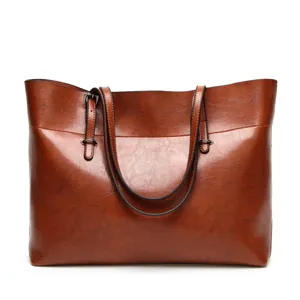 Brown PU leather women tote bag shoulder handbag detail showing texture and dual straps.