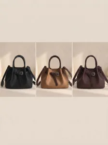 Stylish leather bucket bag with buckle detail, perfect for daily commuting and casual wear.