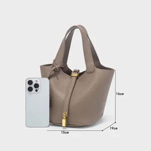 Minimalist PU leather bucket bag with top handles and metal lock, casual everyday handbag.