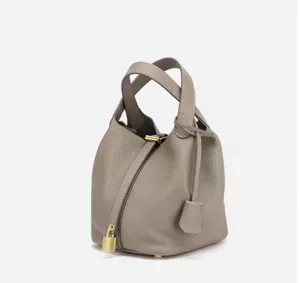 Minimalist grey bucket handbag with metal lock, versatile PU leather daily tote bag for women