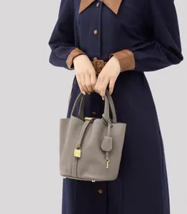 Elegant stylish gray PU leather bucket bag with top handle and padlock charm for women.