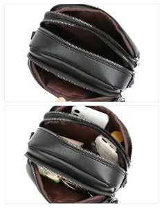 Multi-compartment black leather crossbody bag with multiple smooth zippers for daily use.
