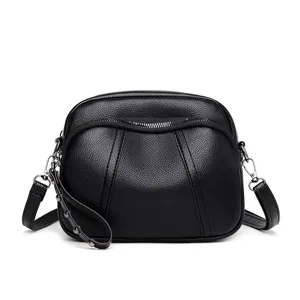 Women fashion black leather crossbody shoulder bag with rivets and zipper, casual small square bag.