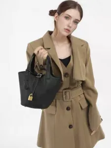 Black PU leather bucket handbag for women, chic minimalist top handle tote bag for daily.