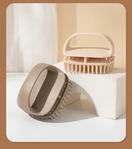Close-up of Japanese style handheld scalp shampoo brushes on geometric display block