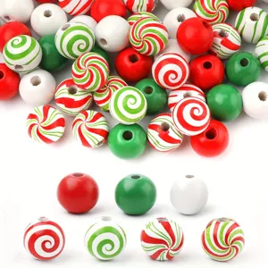 Close-up details of Christmas wooden beads, peppermint swirl patterns, red, green and white.