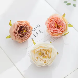 Artificial rose flower heads for DIY crafts, wedding decor, corsages, and floral wall displays.
