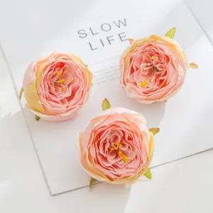 Artificial rose flower heads for DIY crafts, wedding bouquets and romantic party wall decorations.