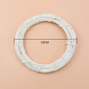 Off-white vine ring detail shot, natural woven rattan wreath circle closeup, 15cm size.