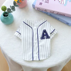 Detailed view of classic striped pet baseball shirt featuring letter embroidery and buttons.