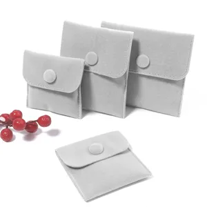 Grey velvet jewelry pouch set with snap button, soft storage bags for rings and necklaces.