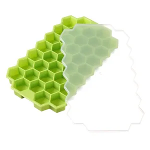 Vassoio per cubetti di ghiaccio in silicone verde a nido d'ape con coperchio trasparente