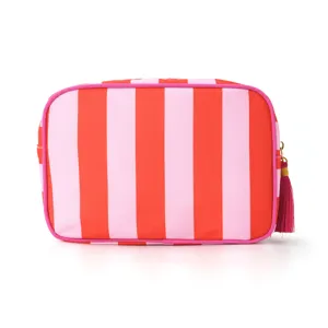 Pink and red striped cosmetic bag with tassel, portable waterproof travel makeup storage pouch.